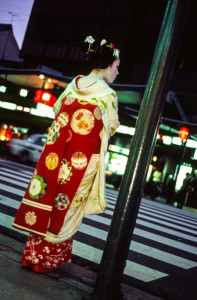 Maiko waiting at red light street in Gion, Kyoto.